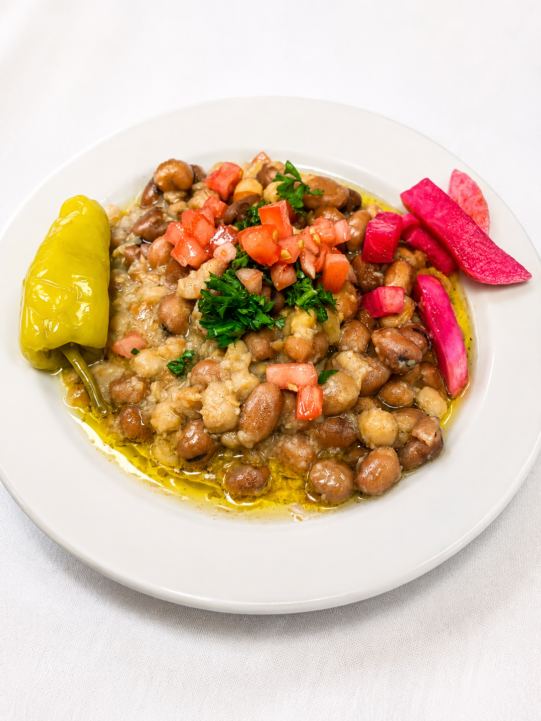 Ful Mdamas – fava beans with chickpeas, tomato and olive oil